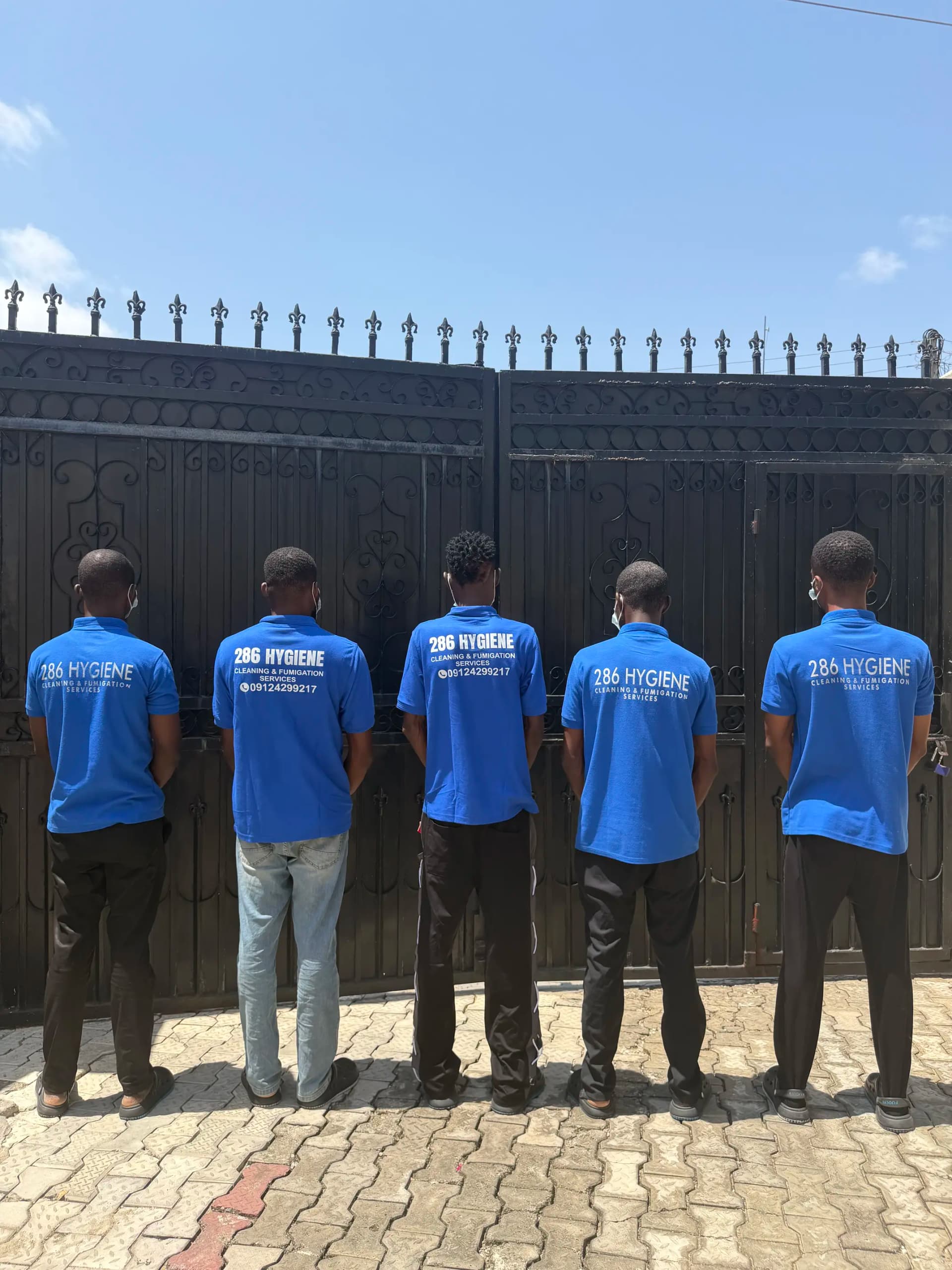 Cleaning team standing in a prepared interior